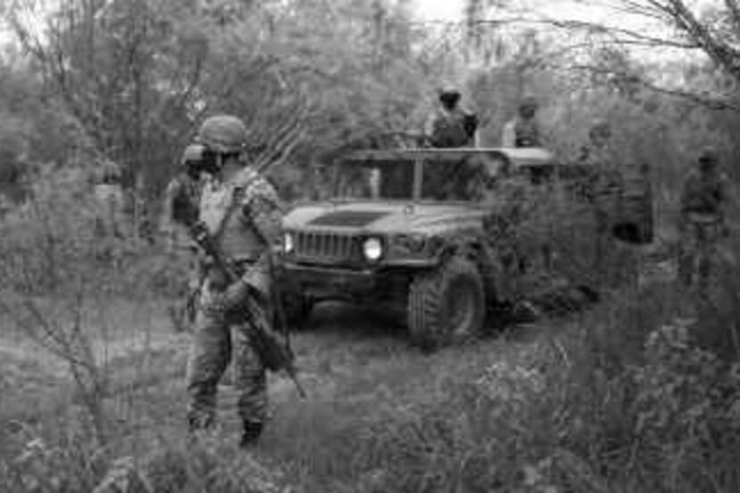 Mexican soldiers patrolled a road near Ciudad Mier, on the Texas-Mexcico border.