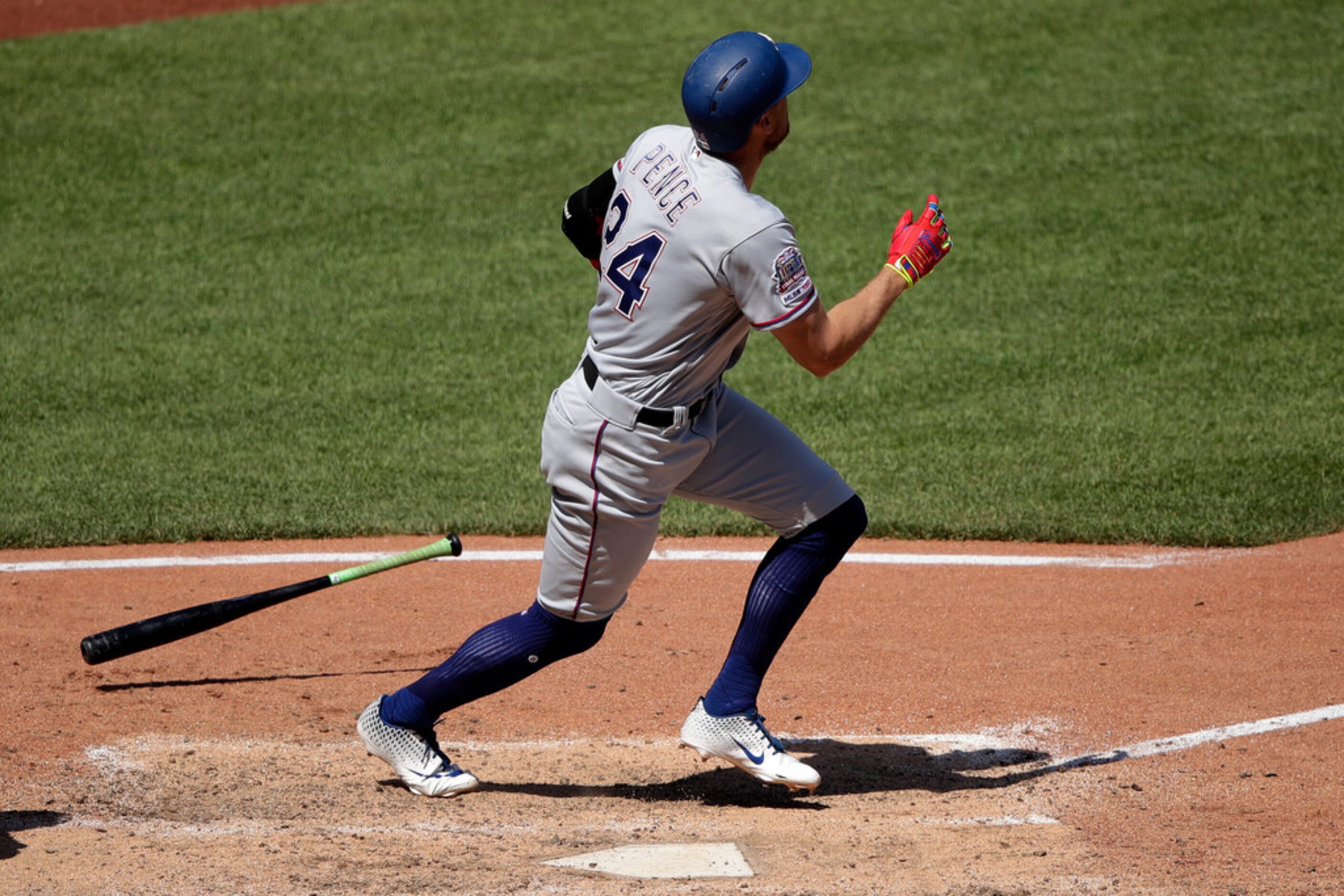 Texas Rangers' Hunter Pence watches his grand slam into the left field stands off Pittsburgh...