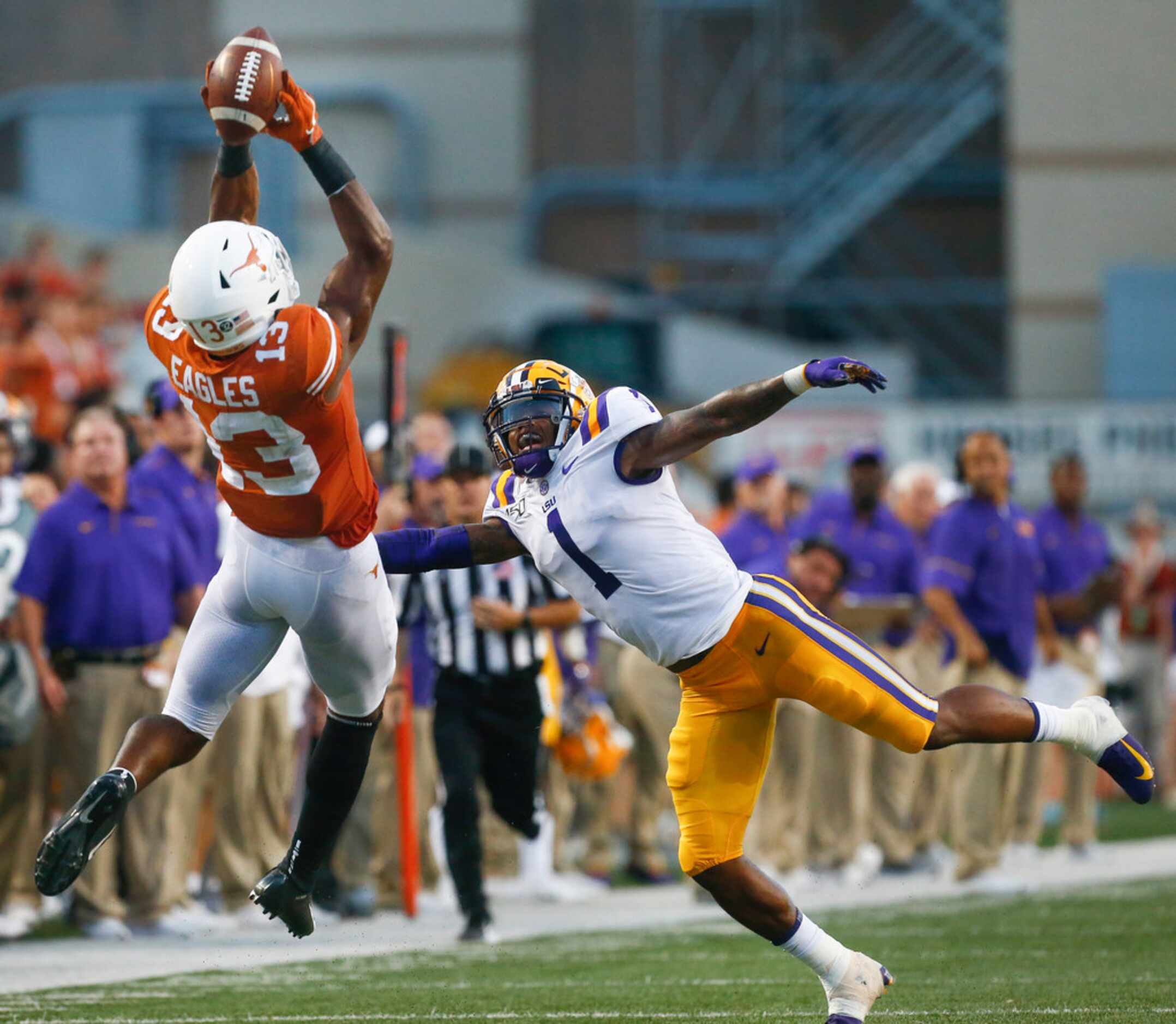 Texas Longhorns wide receiver Brennan Eagles (13) receives a pass over LSU Tigers cornerback...