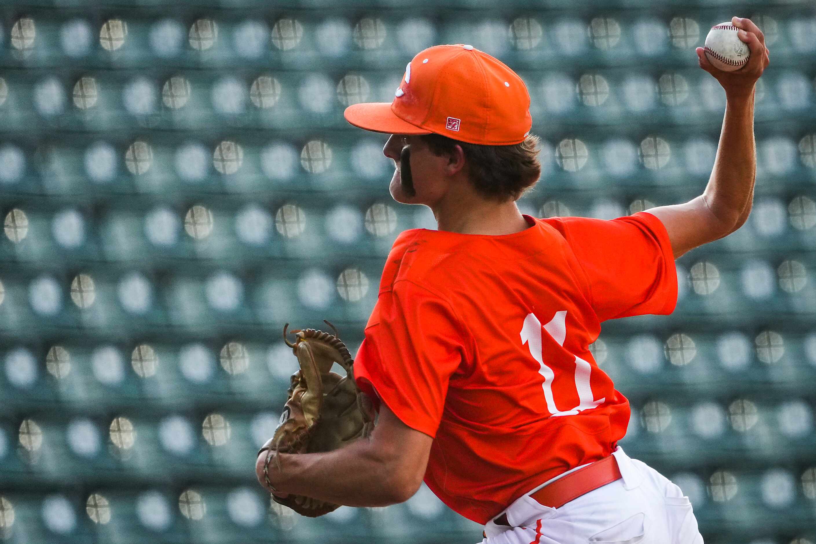 Celina pitcher Zack Henderson (11) delivers during the sixth inning of a UIL 4A baseball...