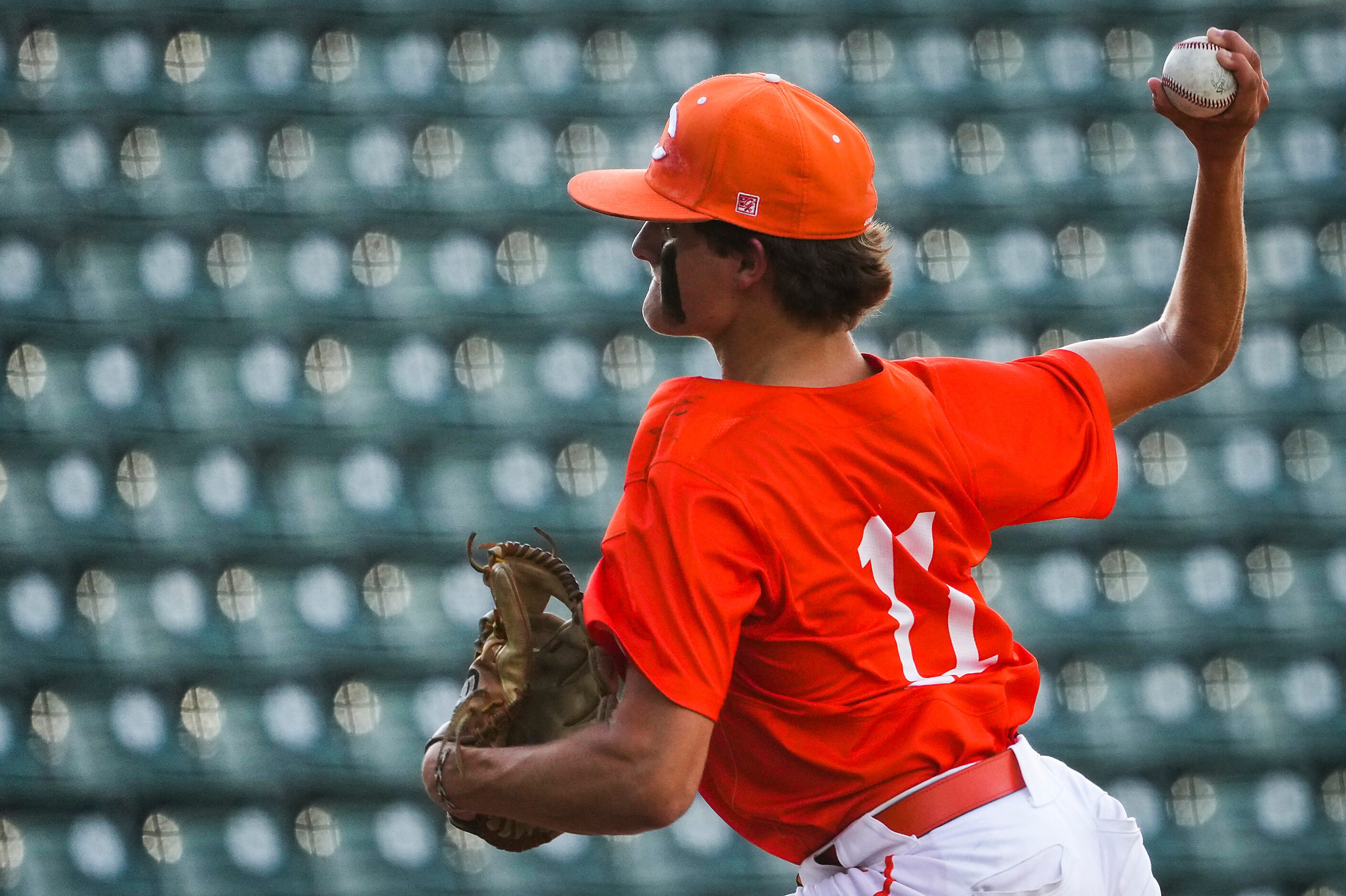 Celina pitcher Zack Henderson (11) delivers during the sixth inning of a UIL 4A baseball...