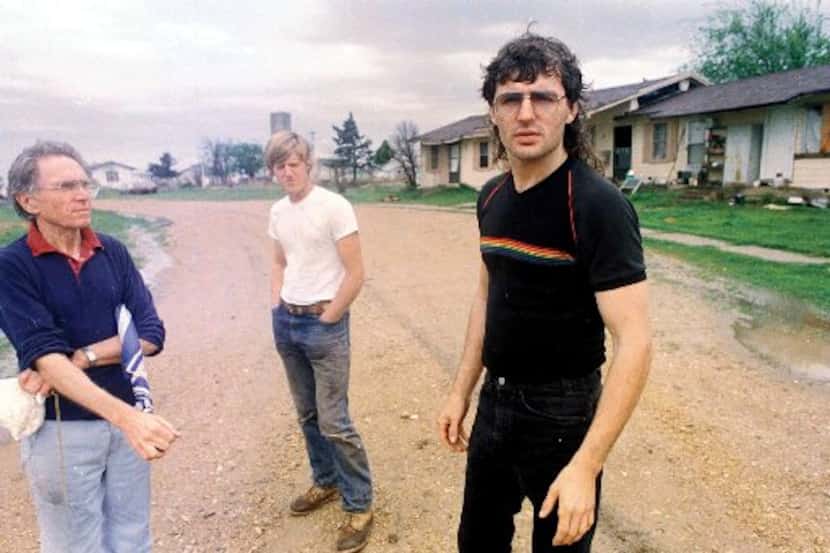 David Koresh (right) stands with his father-in-law Perry Jones (left) and his brother-in-law...
