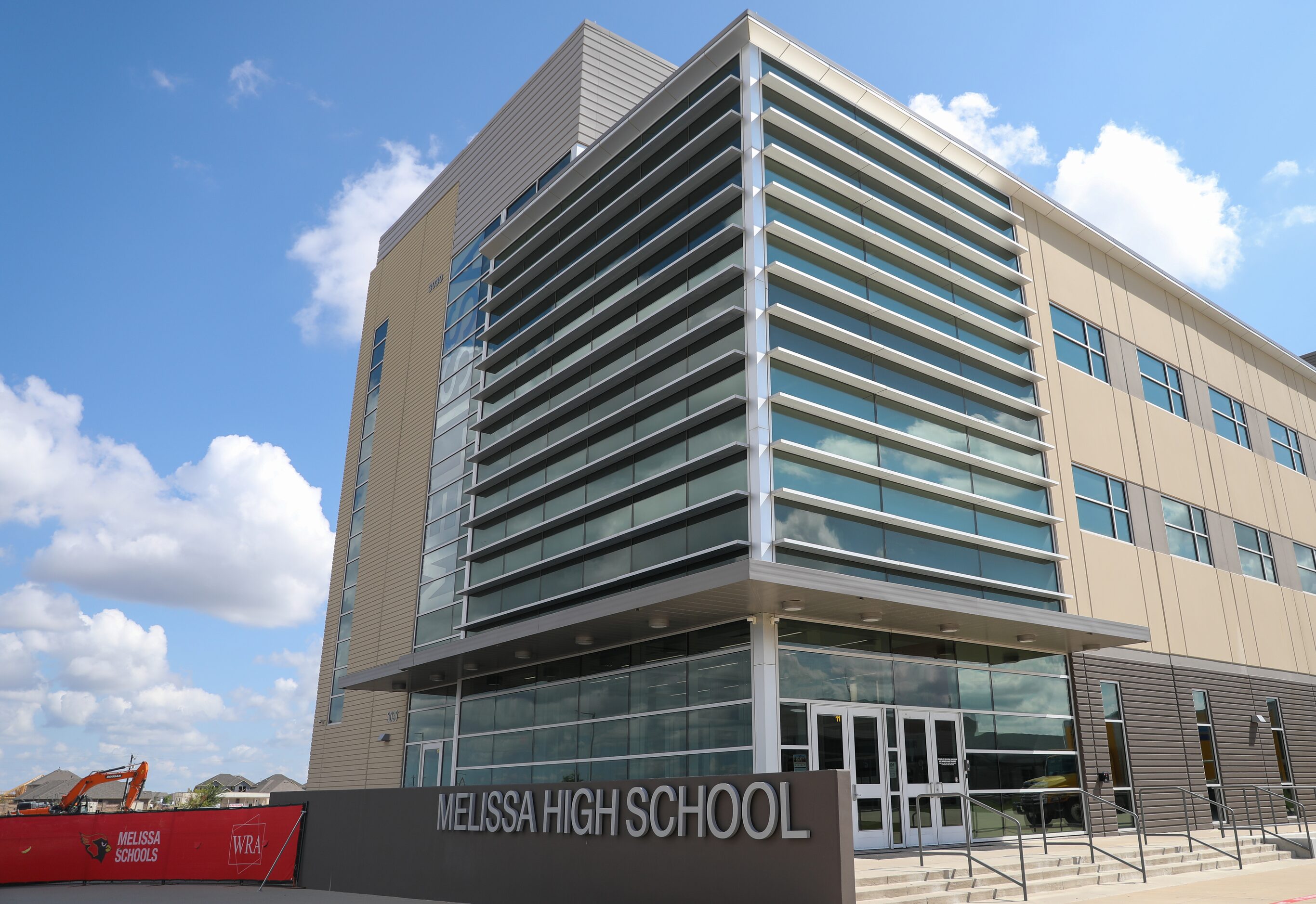 Melissa High School stands several stories tall.