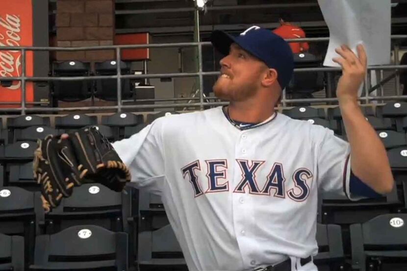 Texas Rangers pitcher Robbie Ross is among a number of players dancing in a video released...