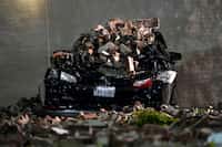 A car in was by crushed by  bricks from a building in downtown Houston after a severe...