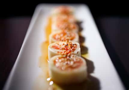 In Oishii's Summer Roll, crab and salmon are wrapped in cucumber and topped with spicy ponzu.