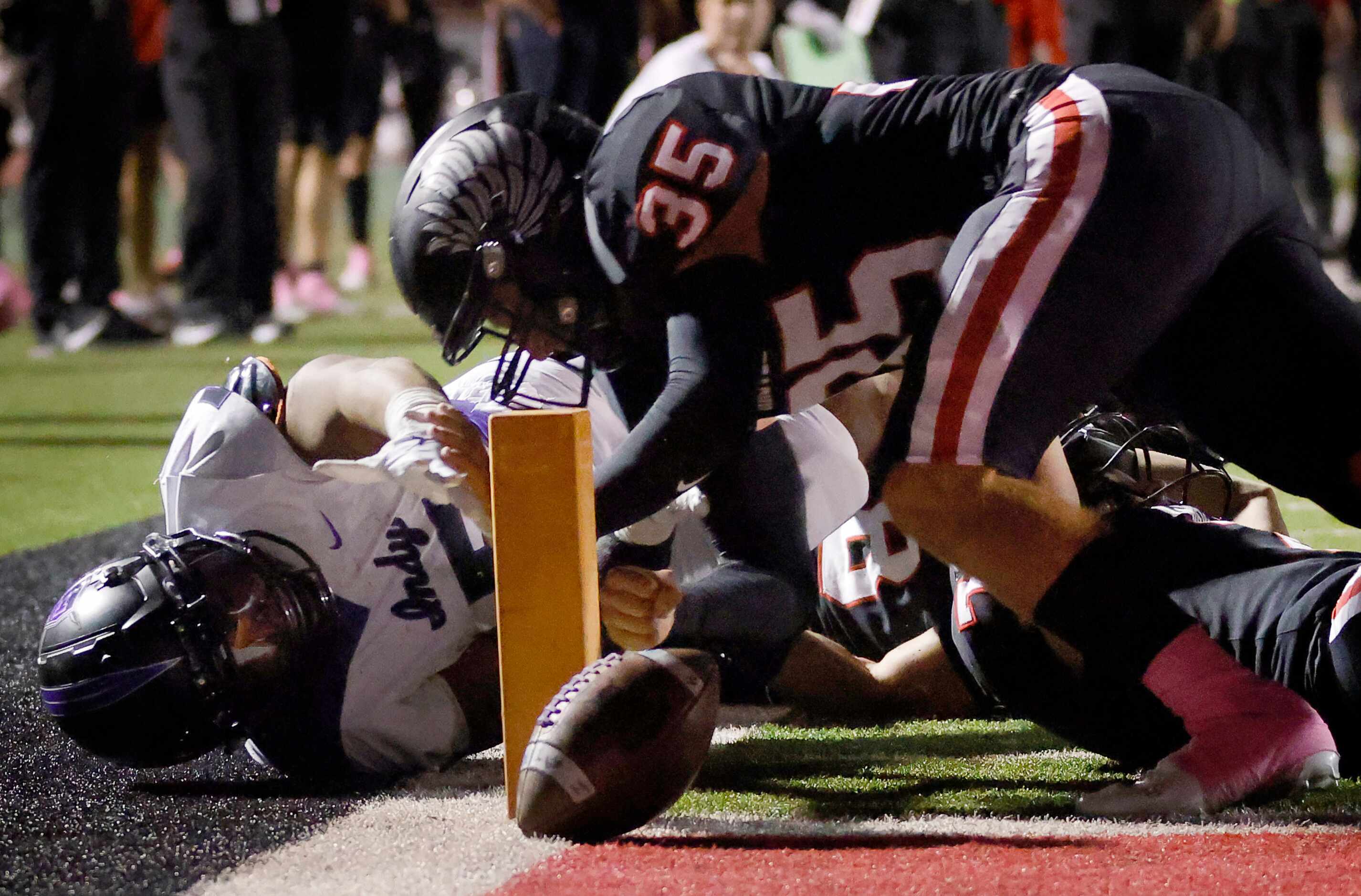 Frisco Independence running back Keith Rockwell (5) fumbled the ball into the end zone as he...