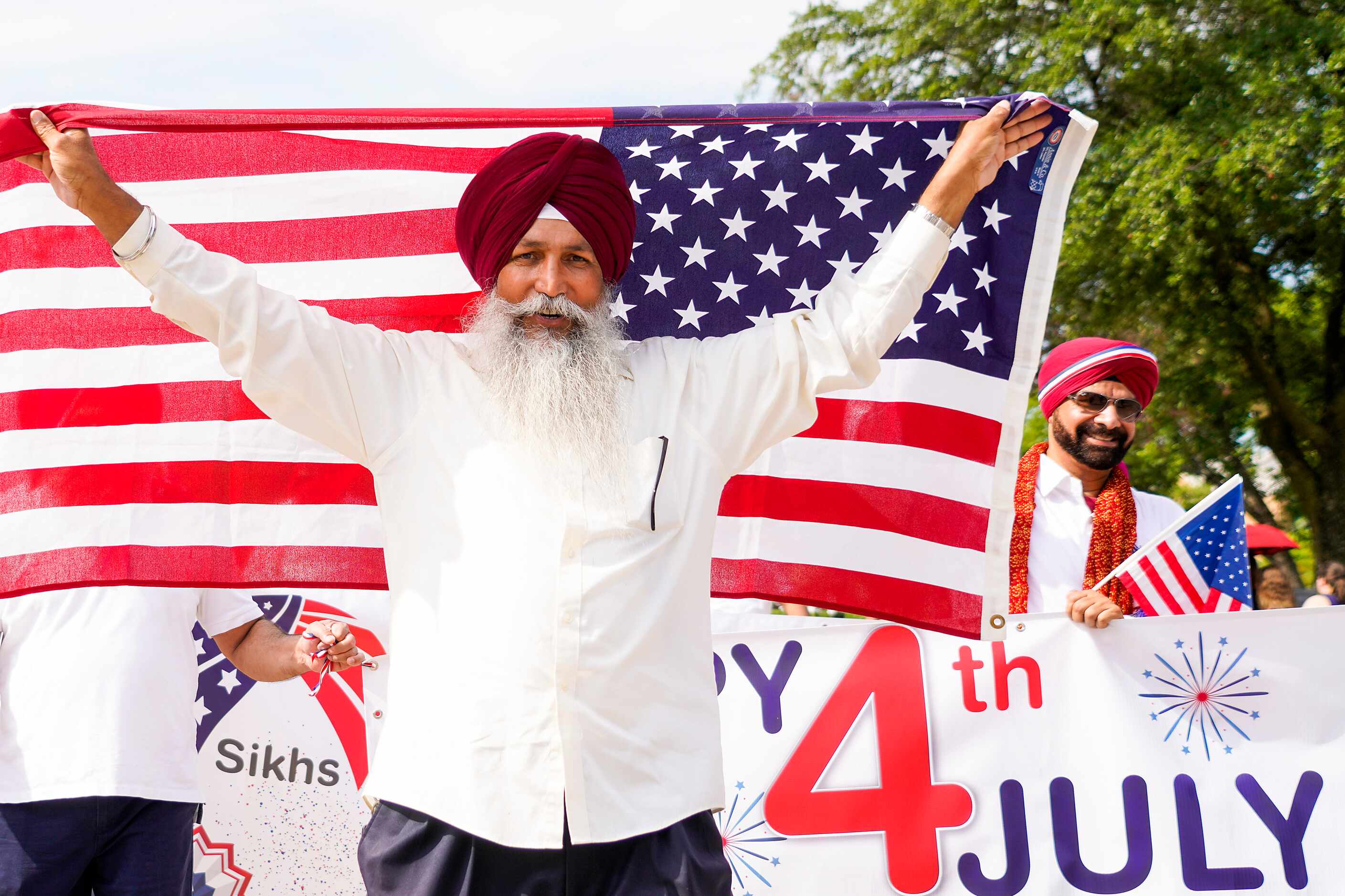 A group representing of the Sikh Community of North Texas marches in the Arlington...
