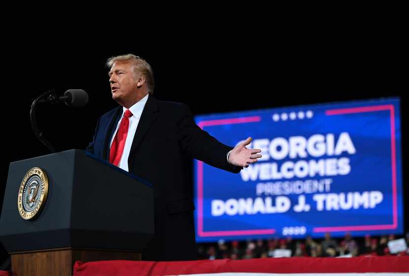 President Donald Trump speaks at a rally in support of Republican U.S. Senate candidates...
