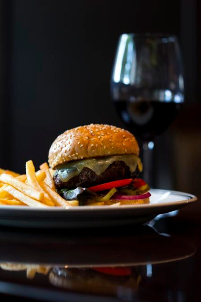 
Swiss cheeseburger and steak fries 
