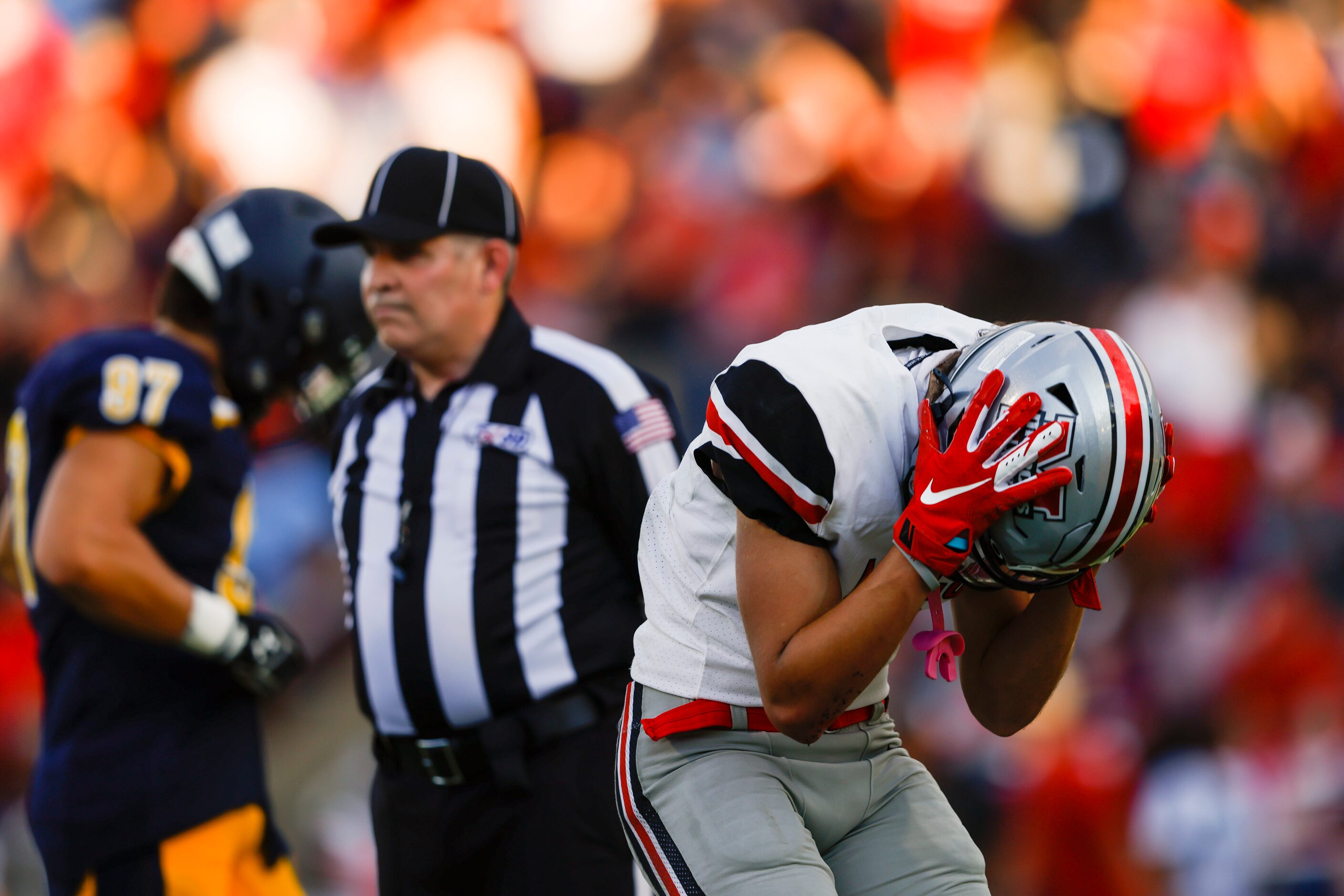 Flower Mound Marcus wide receiver Isaac Khattab (1) reacts to a referees call during the...