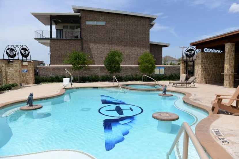 
The club pool at new luxury town home development, Aero Country East, at Aero Country...