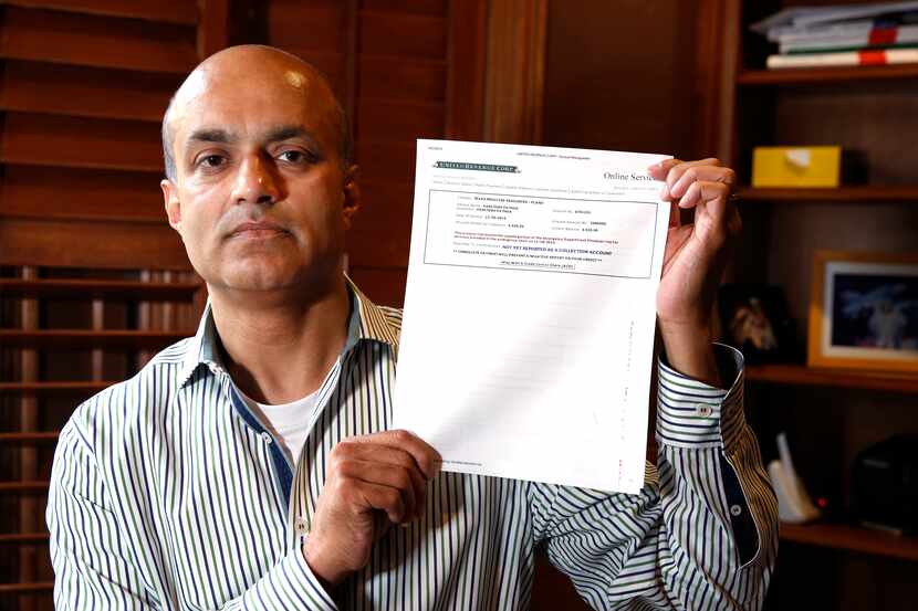 Paritosh Pathak a computer programmer holds a copy of his debt collection noticed he...