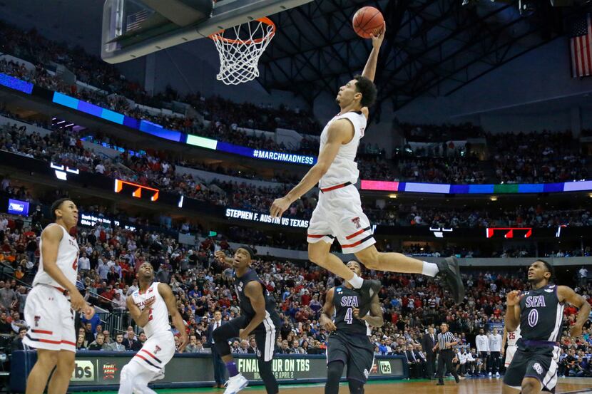 Texas Tech Red Raiders forward Zach Smith (11) flies in for a dunk attempt in the second...
