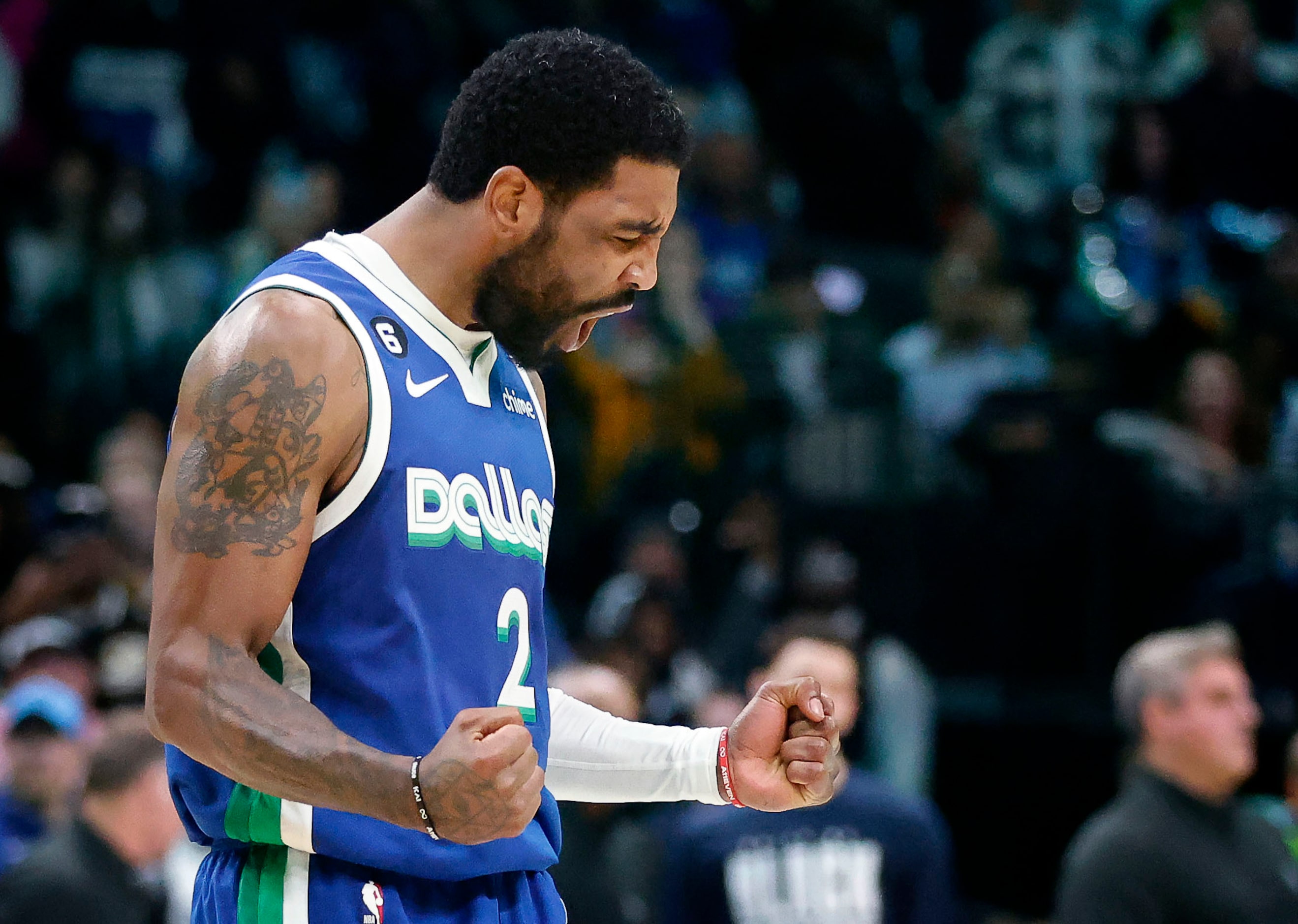 Dallas Mavericks guard Kyrie Irving (2) reacts after nailing a three-pointer during the...