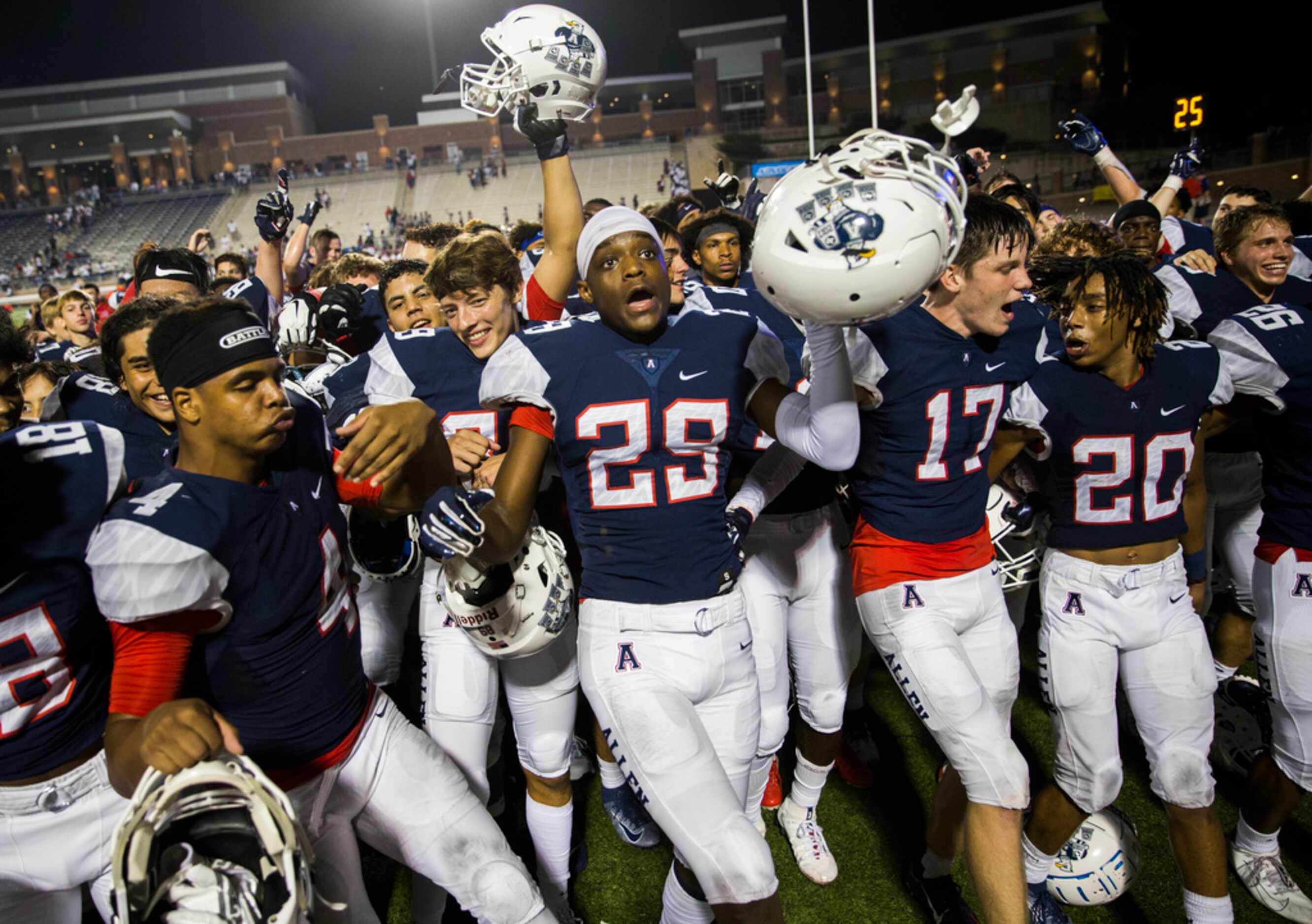Allen players celebrate after a 41-28 win over Cedar Hill on Friday, August 30, 2019 at...