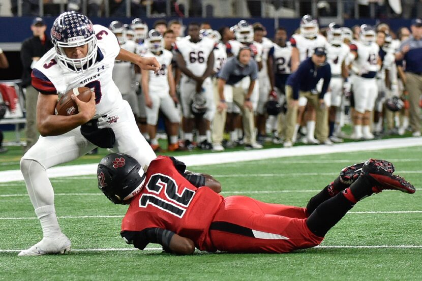 Ryan junior quarterback Spencer Sanders (3) rushes the ball and gets tackled by Colleyville...