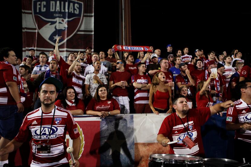Fans cheer on FC Dallas during the FC Dallas vs. Real Salt Lake soccer game on July 13, 2013...