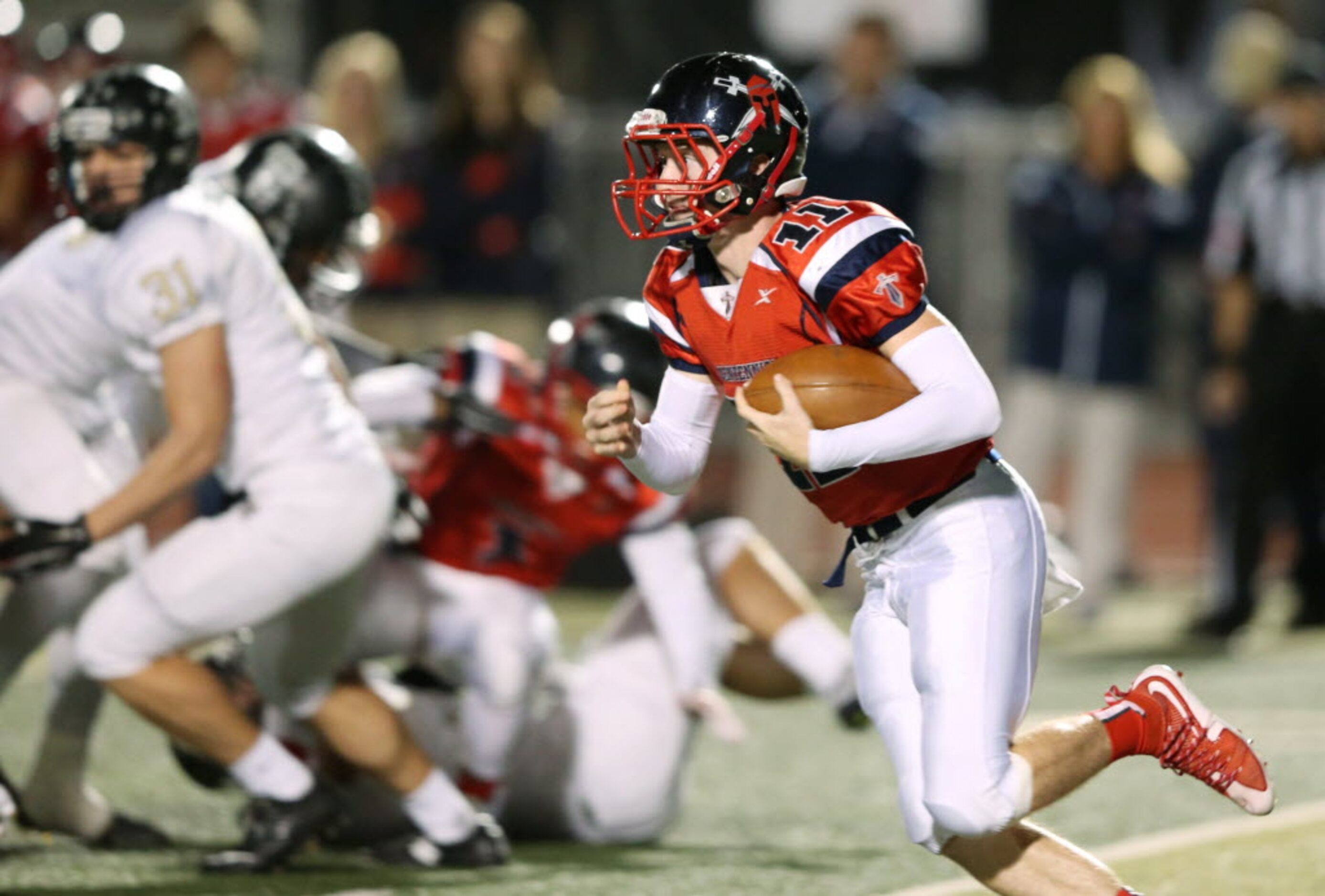 Frisco Centennial's Court Walker (11) runs up the field for a touchdown on a 78 yard run in...