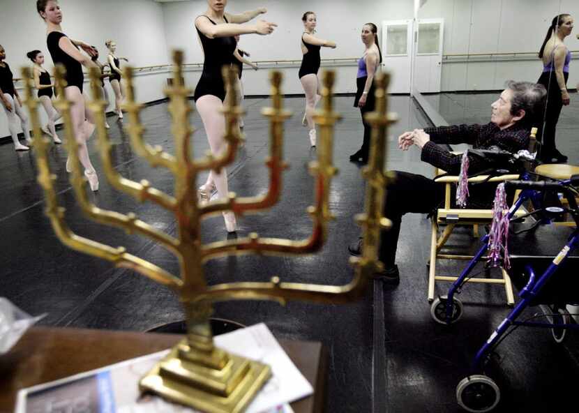 A menorah sits on the piano in the City Ballet dance studio in Dallas as Denise Brown...
