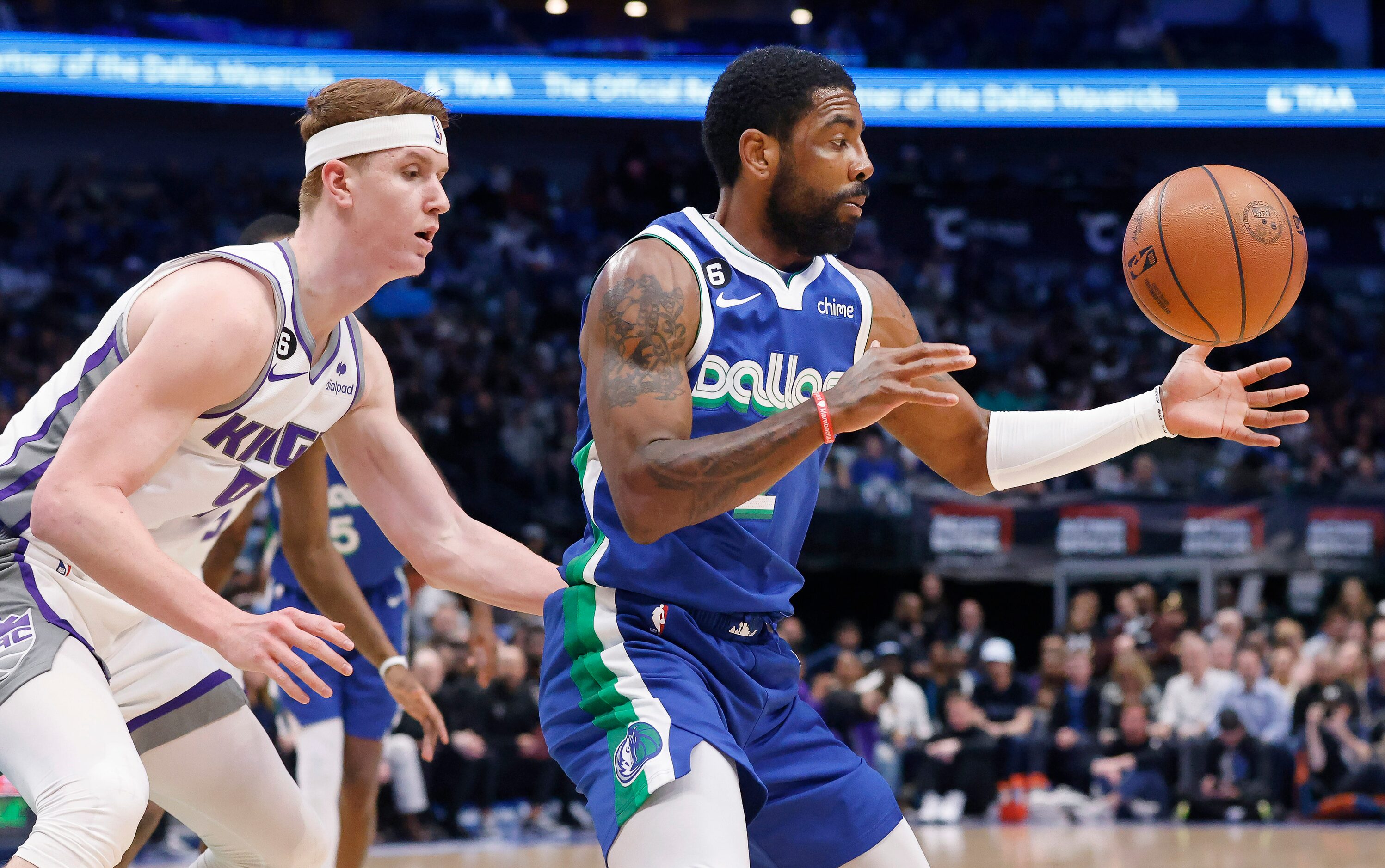 Dallas Mavericks guard Kyrie Irving (2) looses the grip on the ball against Sacramento Kings...