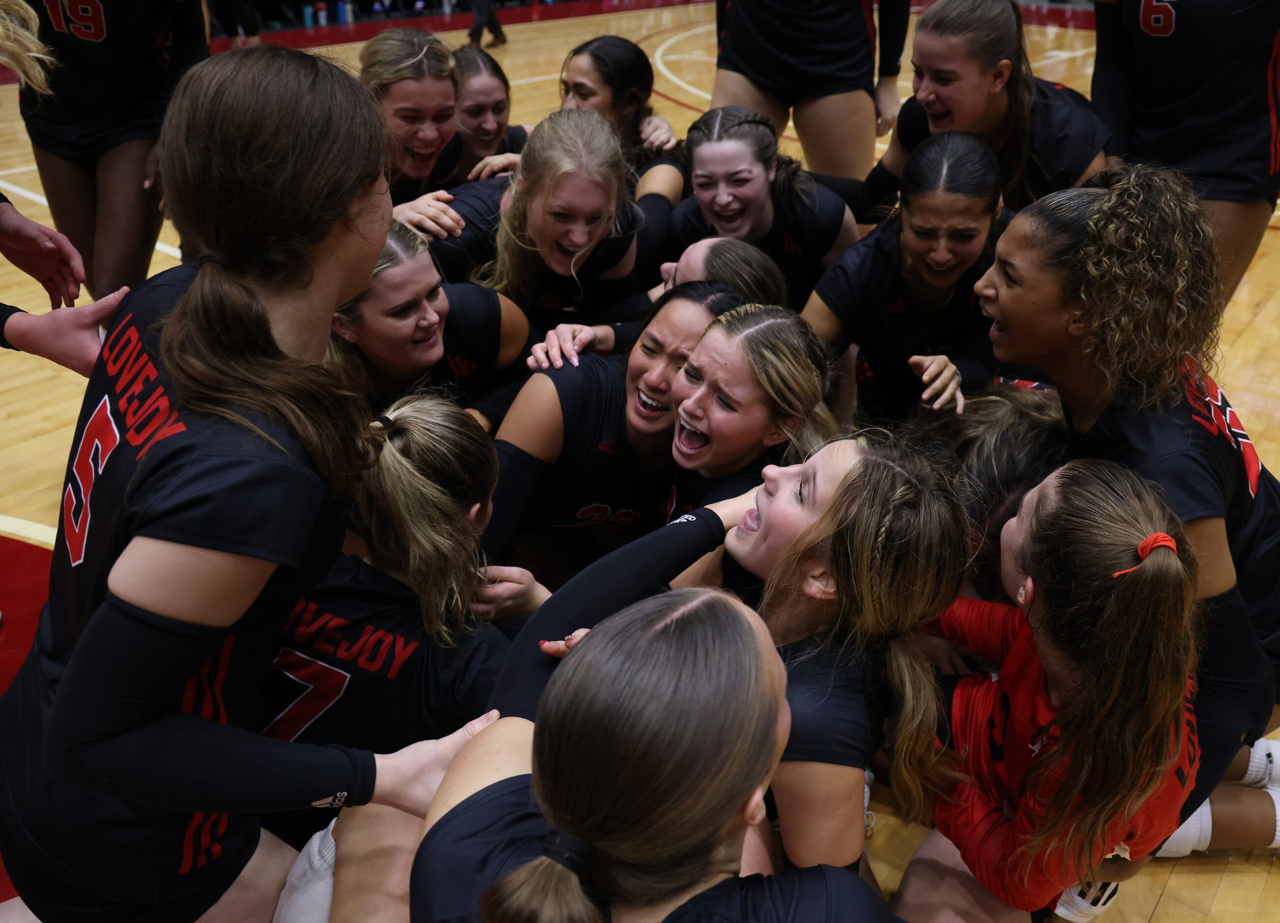 Lucas Lovejoy players revel in the moment as they celebrate their straight sets victory over...