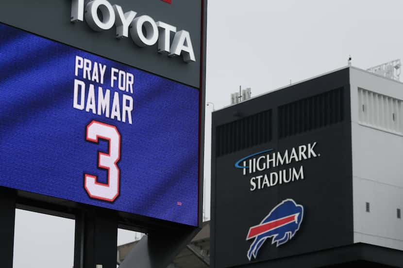 A sign shows support for Buffalo Bills safety Damar Hamlin outside Highmark Stadium on...