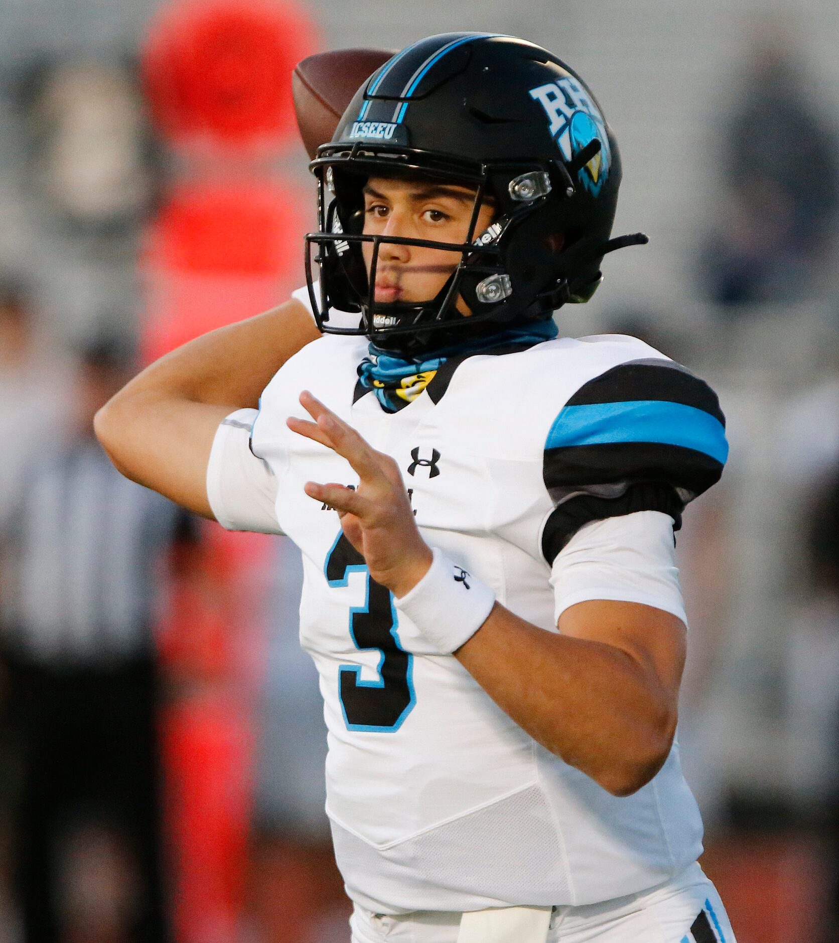 Rock Hill High School quarterback Brenner Cox (3) makes a throw during the quarter half as...