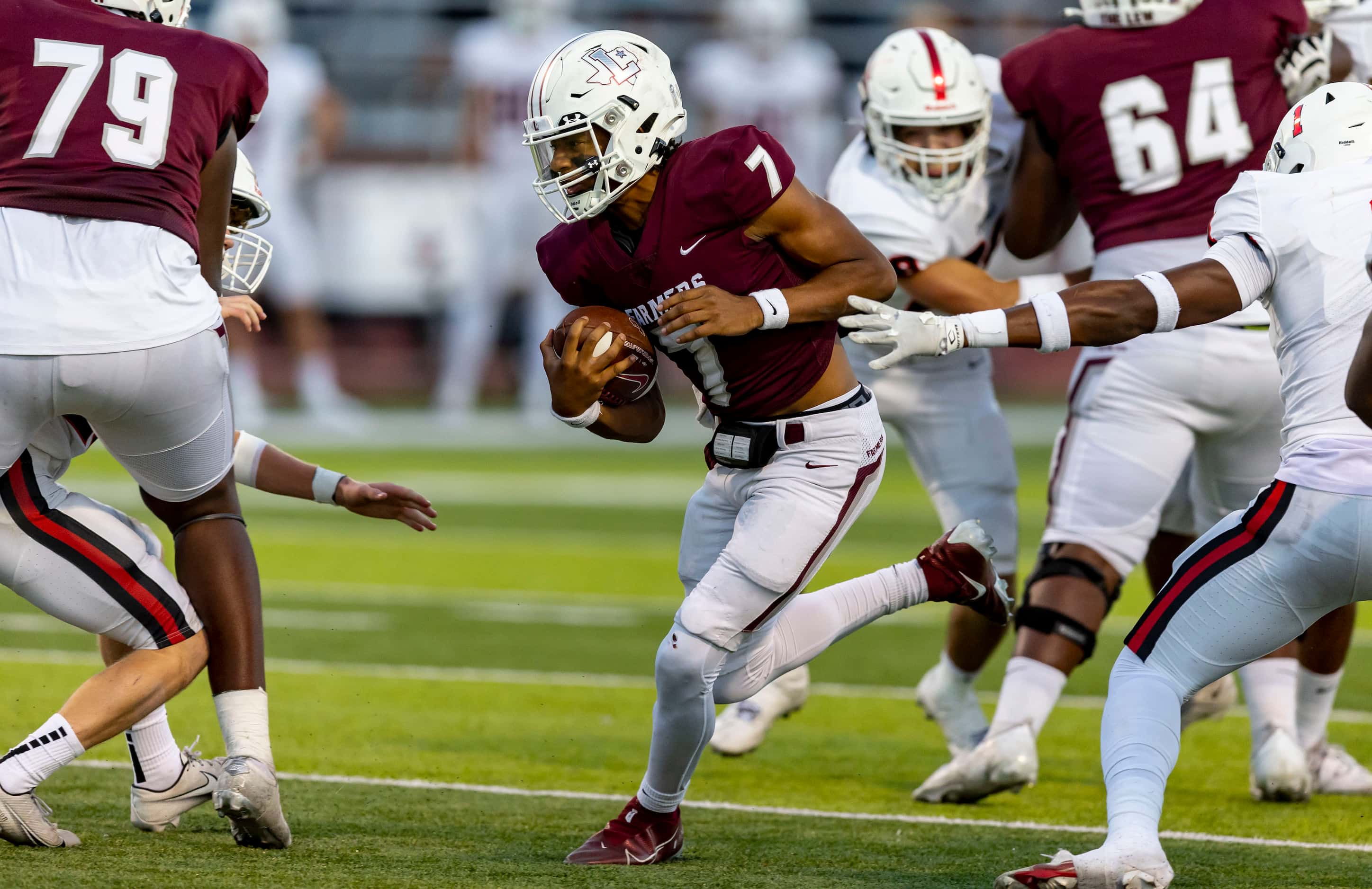 Lewisville junior quarterback Ethan Terrell (7) carries the ball during the first half of a...
