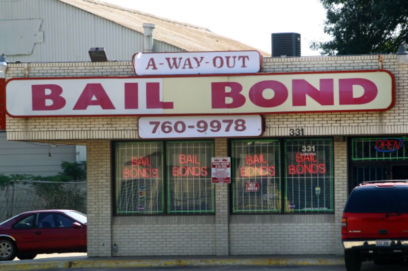 Bail bond offices dot the landscape on Riverfront Boulevard in Dallas near the Lew Sterrett...