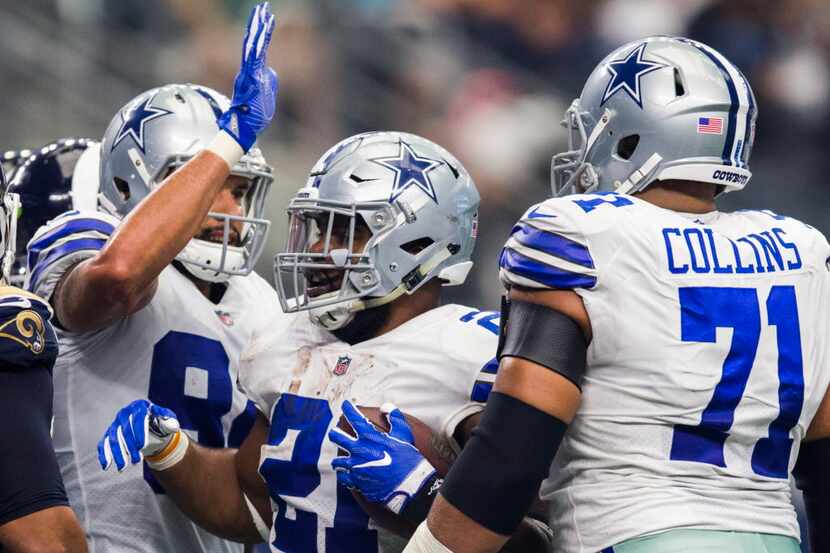 Dallas Cowboys running back Ezekiel Elliott (21) celebrates a touchdown during the second...