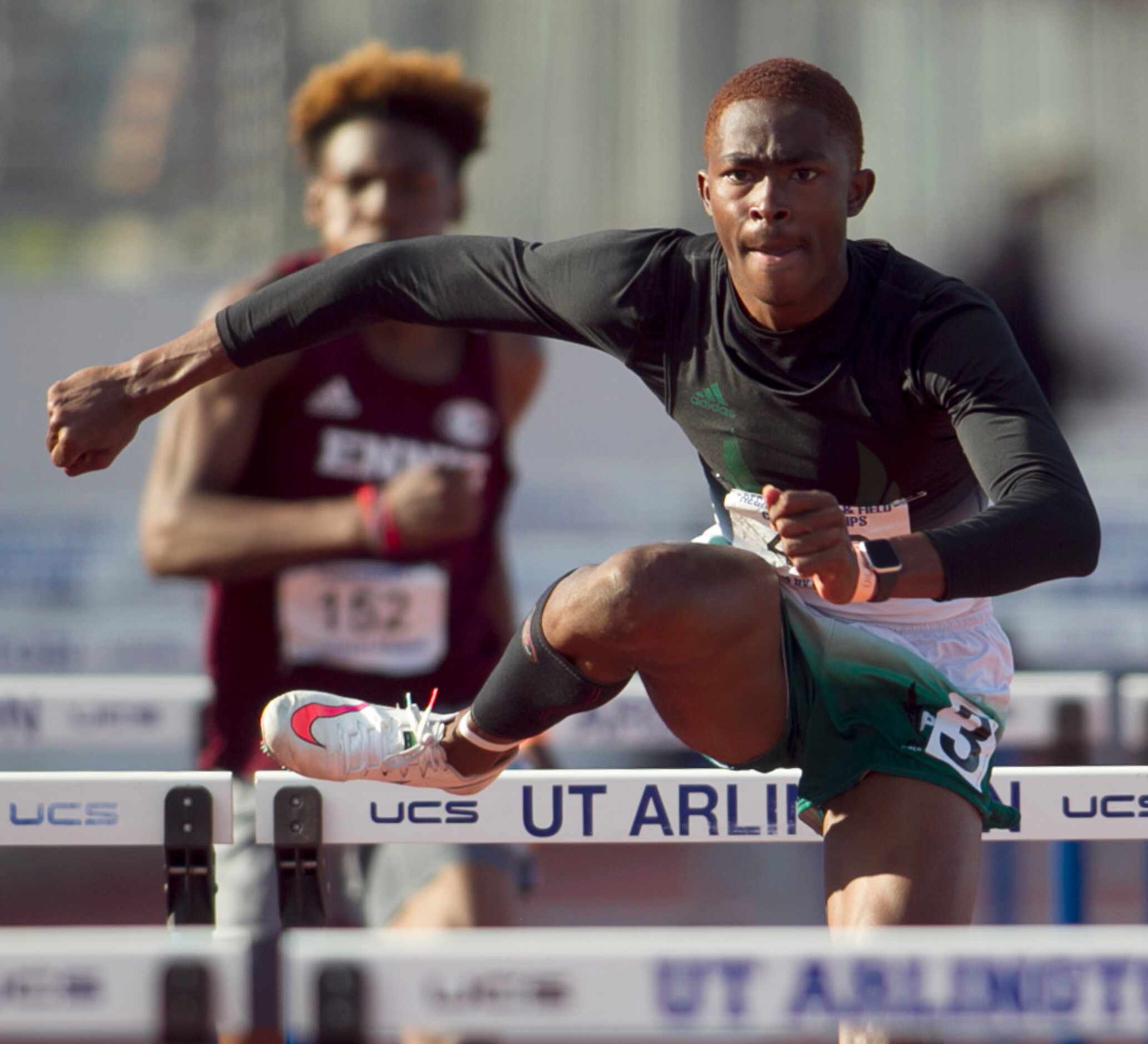 Mesquite Poteet's Kendrick Smallwood clears a hurdle enroute to his victory in the Class 5A...