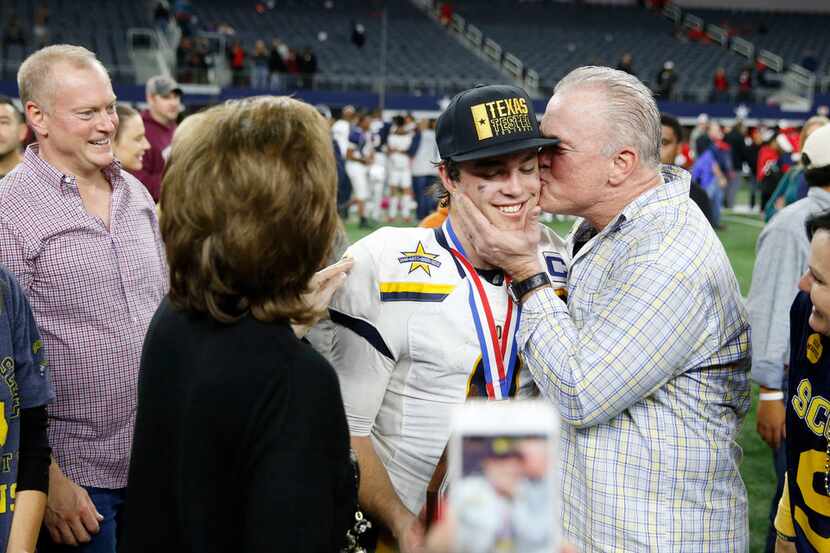 Highland Park's John Stephen Jones gets a kiss from his dad Dallas Cowboys executive vice...