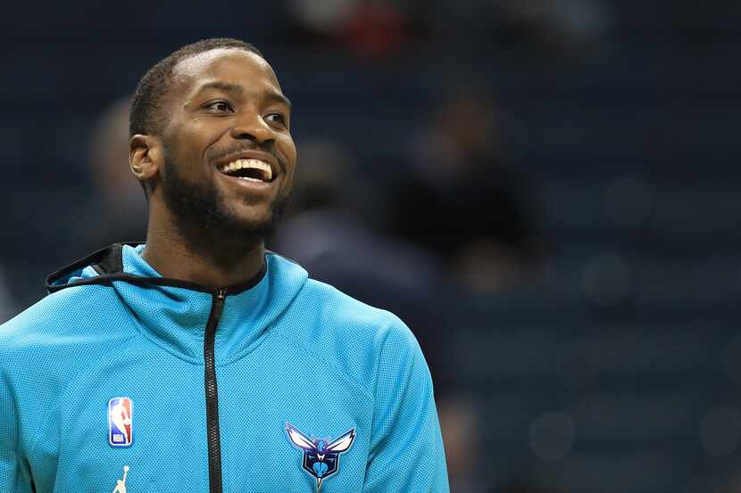Michael Kidd-Gilchrist #14 of the Charlotte Hornets watches on before their game against the...