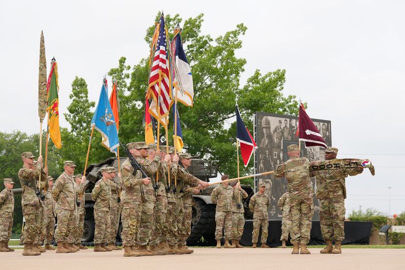 The honor guard cases the Fort Hood colors during the installation redesignation ceremony at...