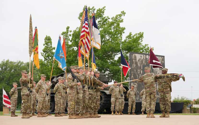 An honor guard cases the Fort Hood colors during a May 9, 2023, ceremony renaming the Army's...