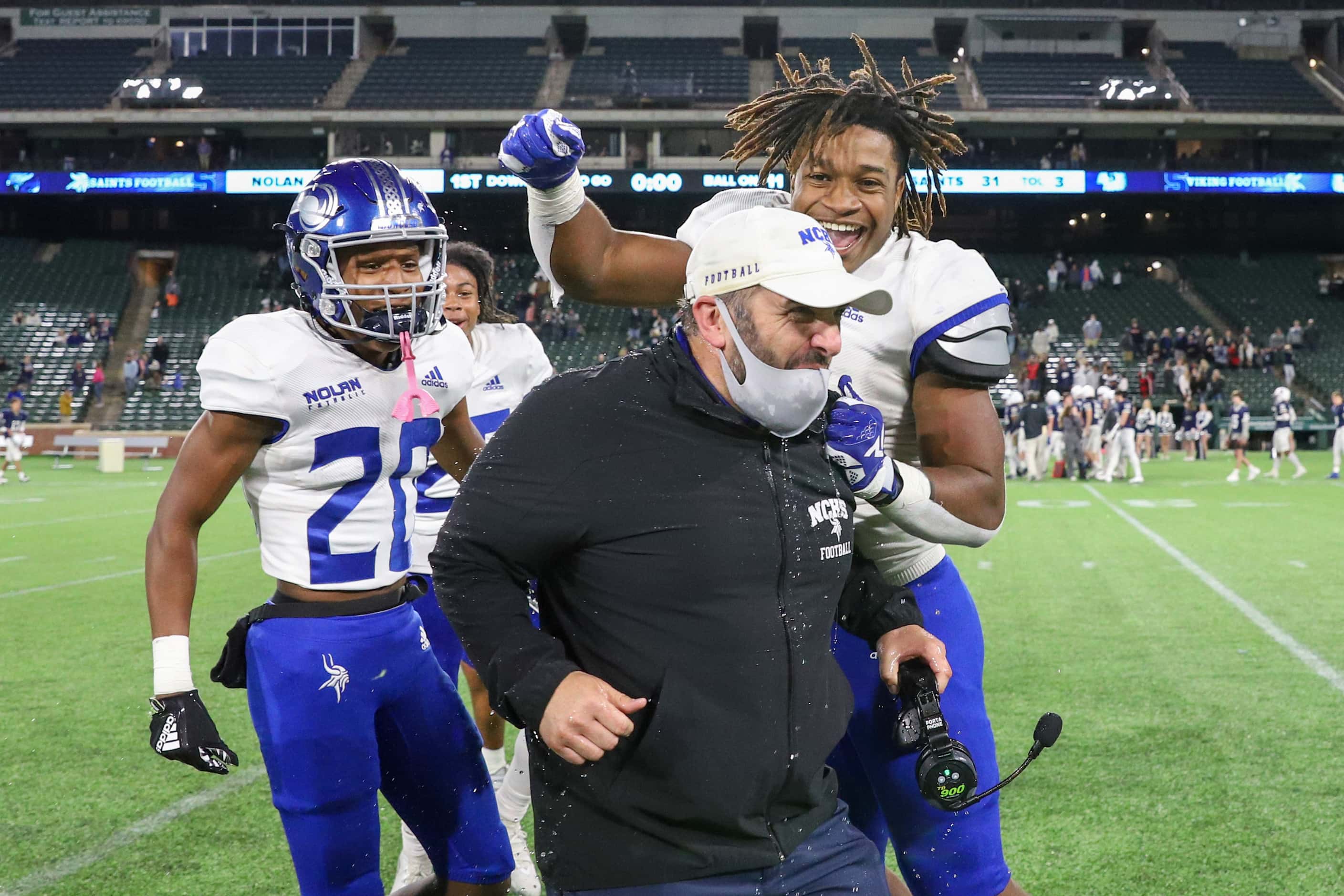 Fort Worth Nolan head coach David Beaudin celebrates the win over Fort Worth All Saints with...