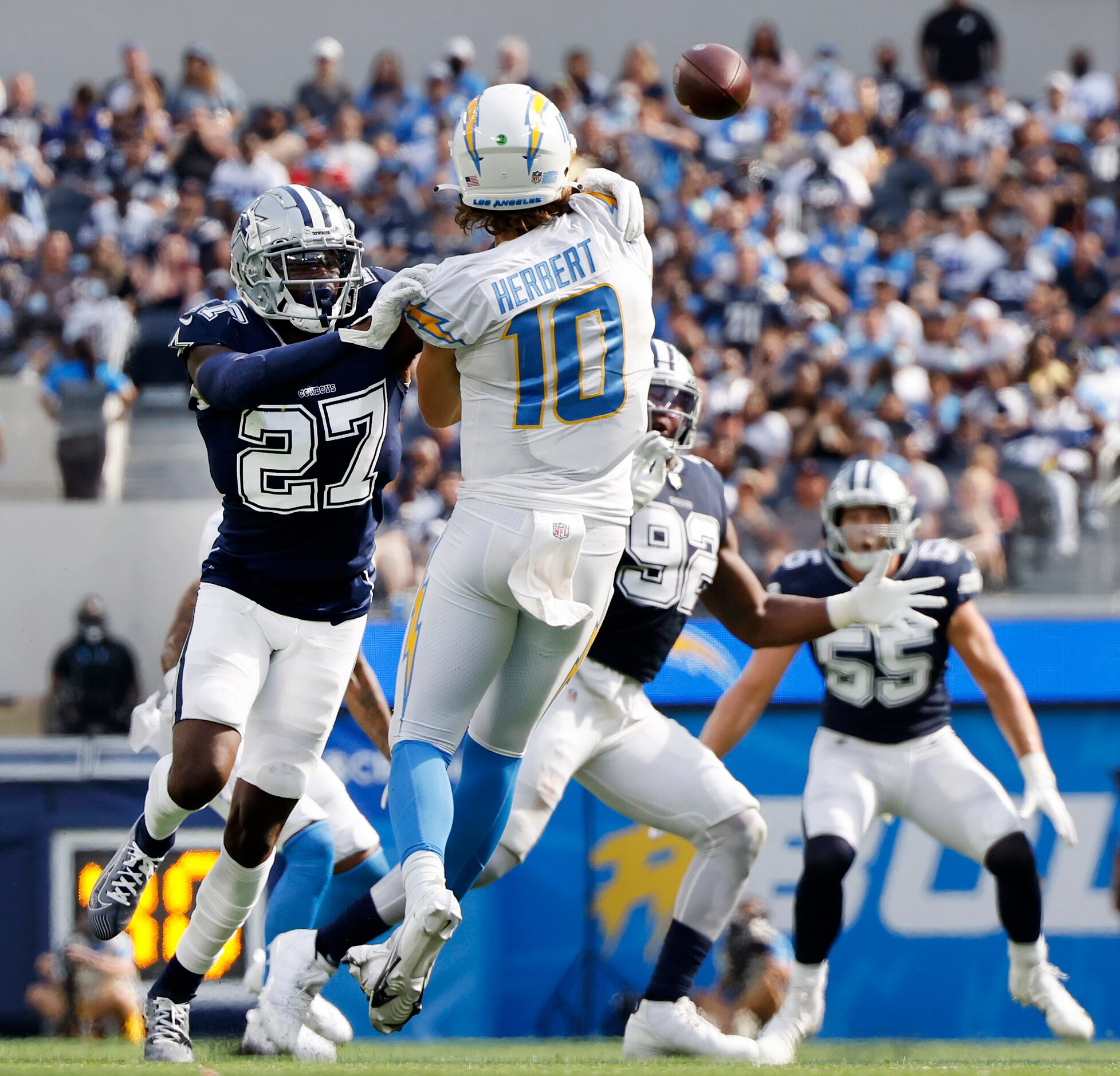 Dallas Cowboys safety Jayron Kearse (27) pressures Los Angeles Chargers quarterback Justin...