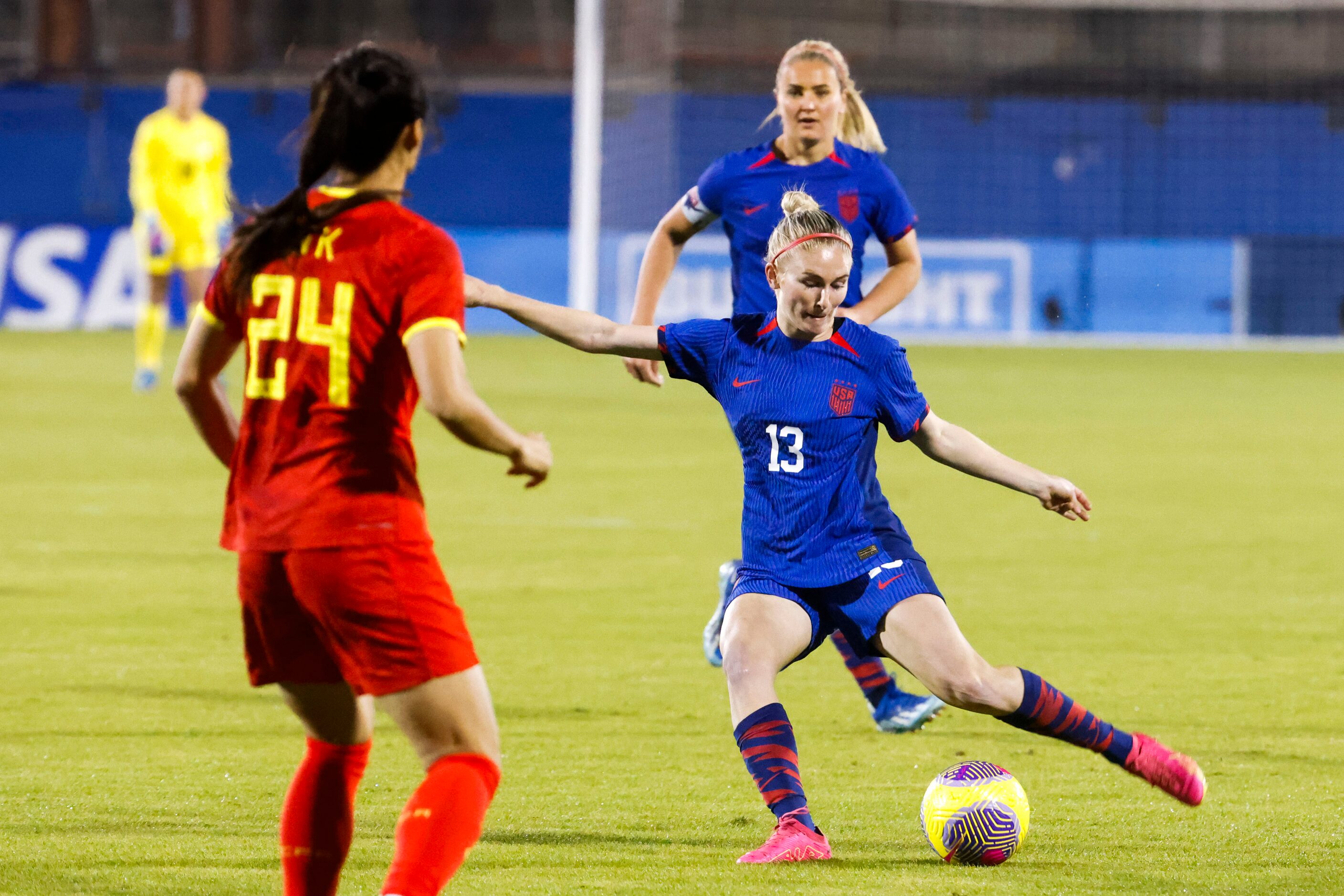 United State’s Jenna Nighswonger (13) shoots during the first half of a soccer game against...