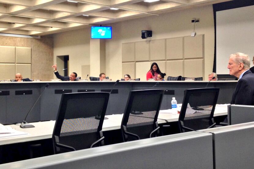 Walt Humann, at the end of a long day, takes questions from the park board. (Robert...