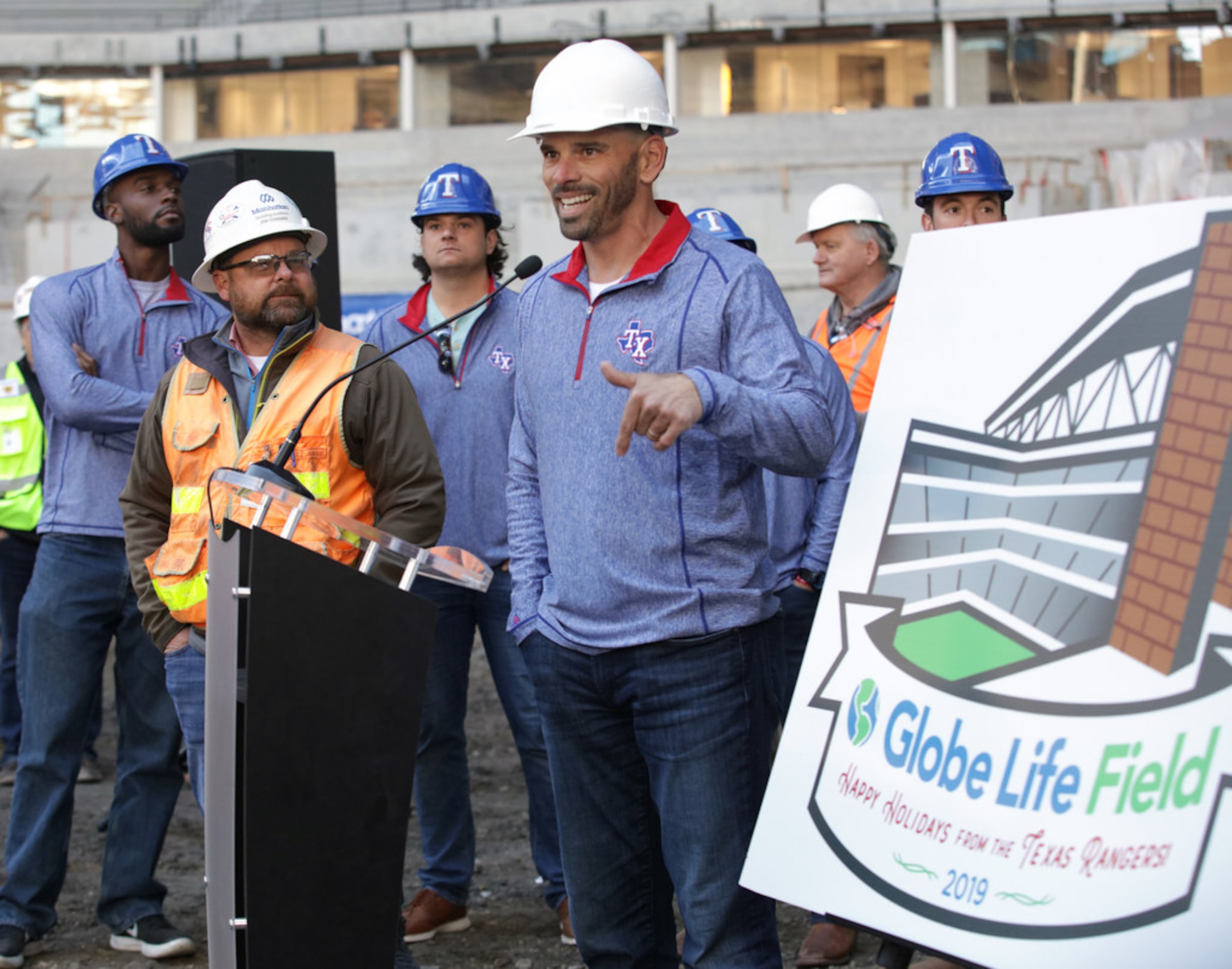 Rangers Manager Chris Woodward speaks to construction workers during a holiday lunch at...