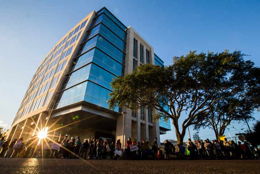 Activists picket outside the corporate offices of Energy Transfer Partners, the Dallas...