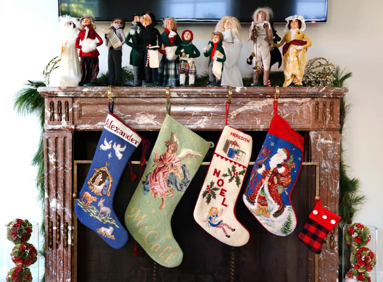 The needlepoint stockings were hung with care at Land's Dallas home, which she has filled...