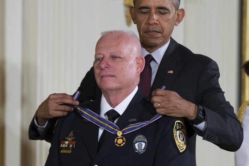 President Barack Obama awards the Medal of Valor to Garland, Texas, police officer Gregory...