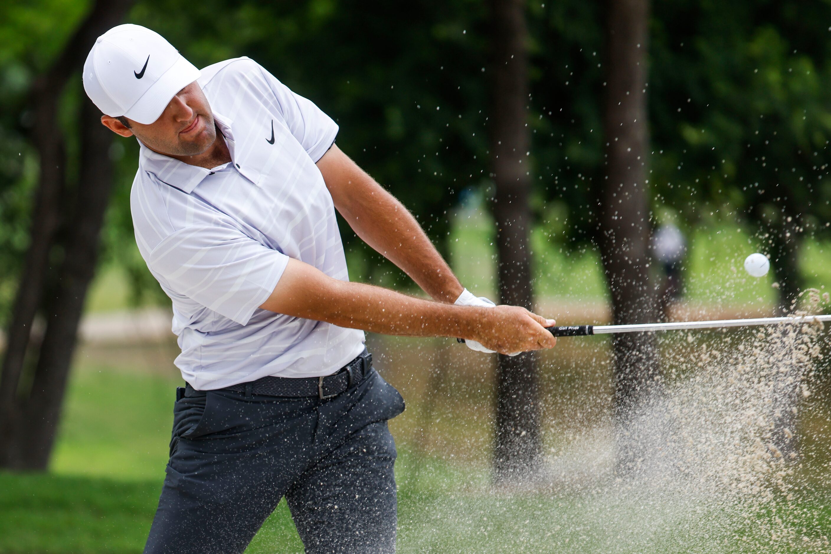 Scottie Scheffler of United States hits on the eighth hole during the second round of the...