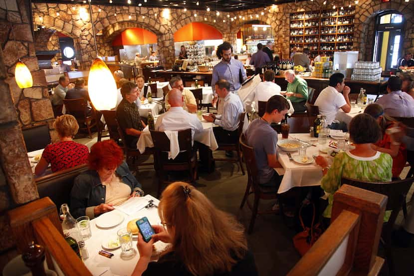 The noon-hour crowd used to fill in for lunch at Romano's Macaroni Grill on Northwest Hwy...
