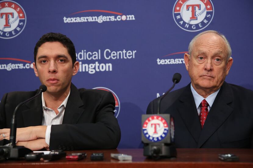 Texas Rangers GM Jon Daniels (left) and President Nolan Ryan talk to media after losing in...