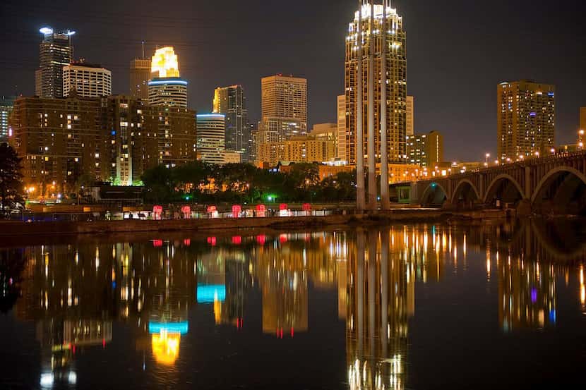 The Minneapolis skyline shines at night. 