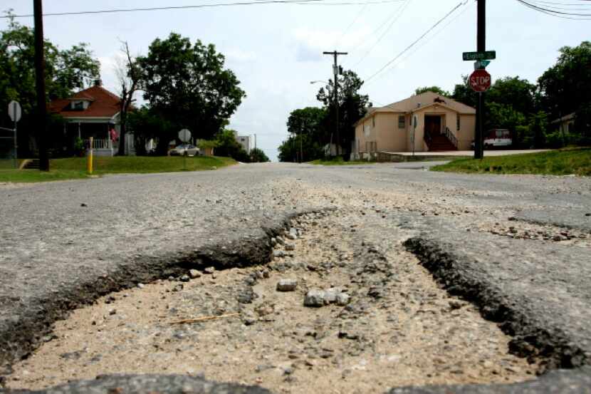 A pothole on Madison Avenue near Eighth Street in Oak Cliff on June 08, 2010 in Dallas. (BEN...