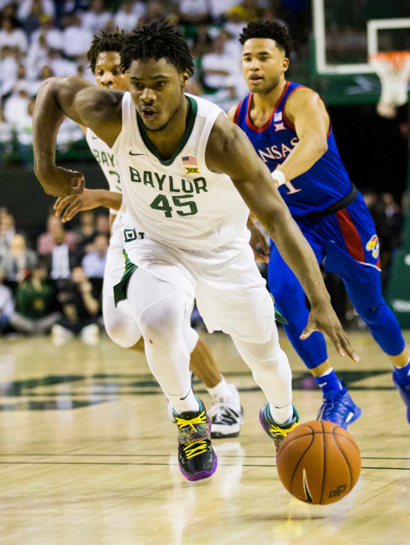 Baylor Bears guard Davion Mitchell (45) takes the ball down the court during the first half...
